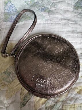 Coach Metallic Bronze Round Wristlet With Keychain in Excellent Used Condition